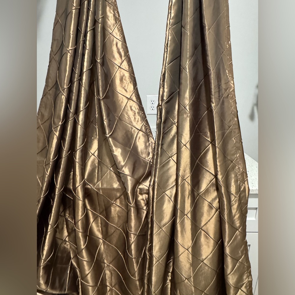 One pair 54” x 84” curtains with grommets